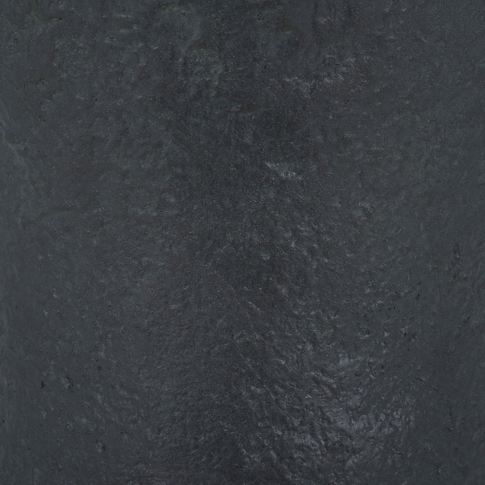 A softly mottled black surface gives the planter a weathered, stone-like finish. || PAT5038E || swatch_studio