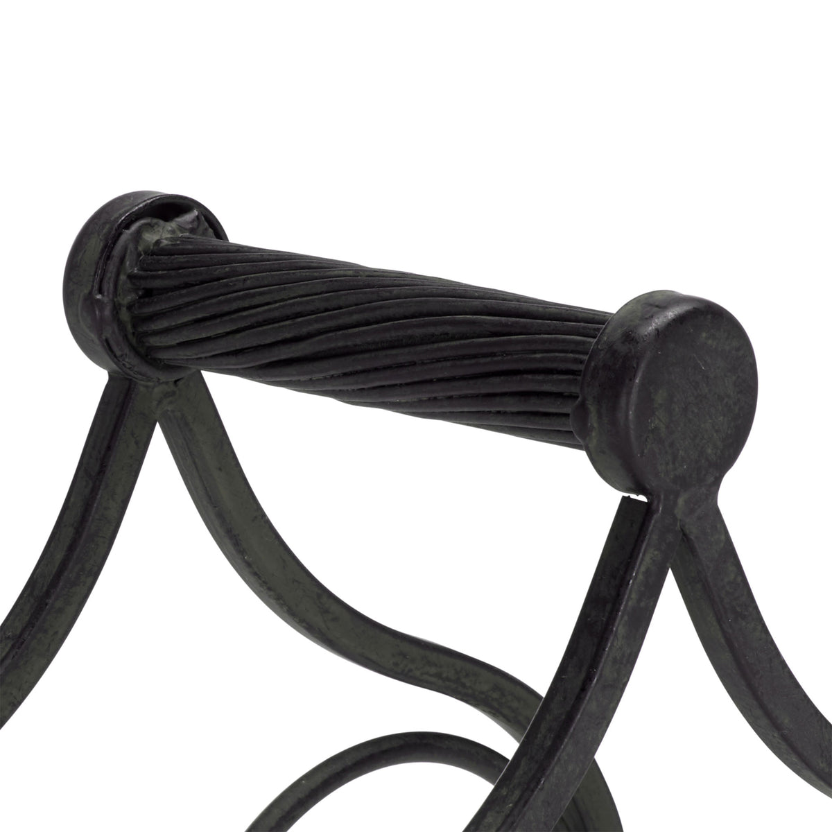 A twisted iron handle adds texture and a comfortable grip to the black wine holder. || PAT5041E || handle_studio