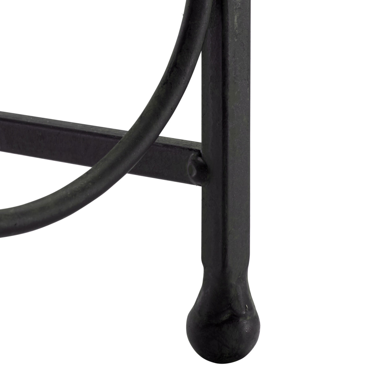 Rounded black iron feet steady the slender wine holder frame. || PAT5041E || leg_studio
