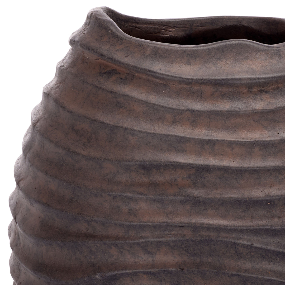 An organically uneven rim crowns the brown planter's layered, textured ridges