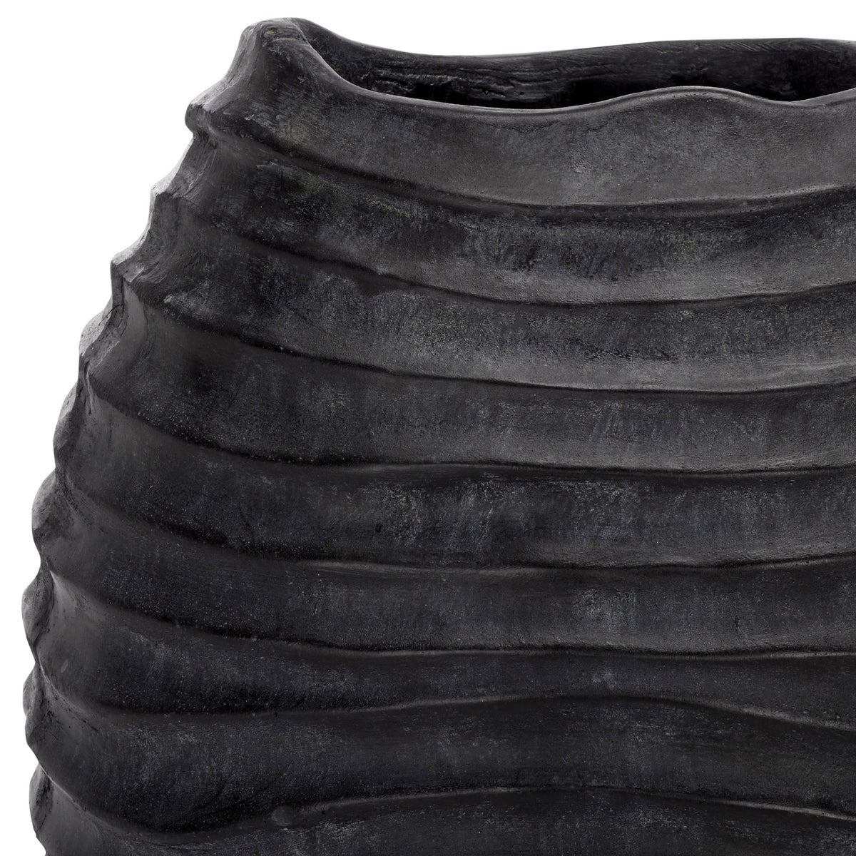 An irregular rim meets pronounced waves in the planter's subtly weathered black finish || PAT5043E || detail_studio