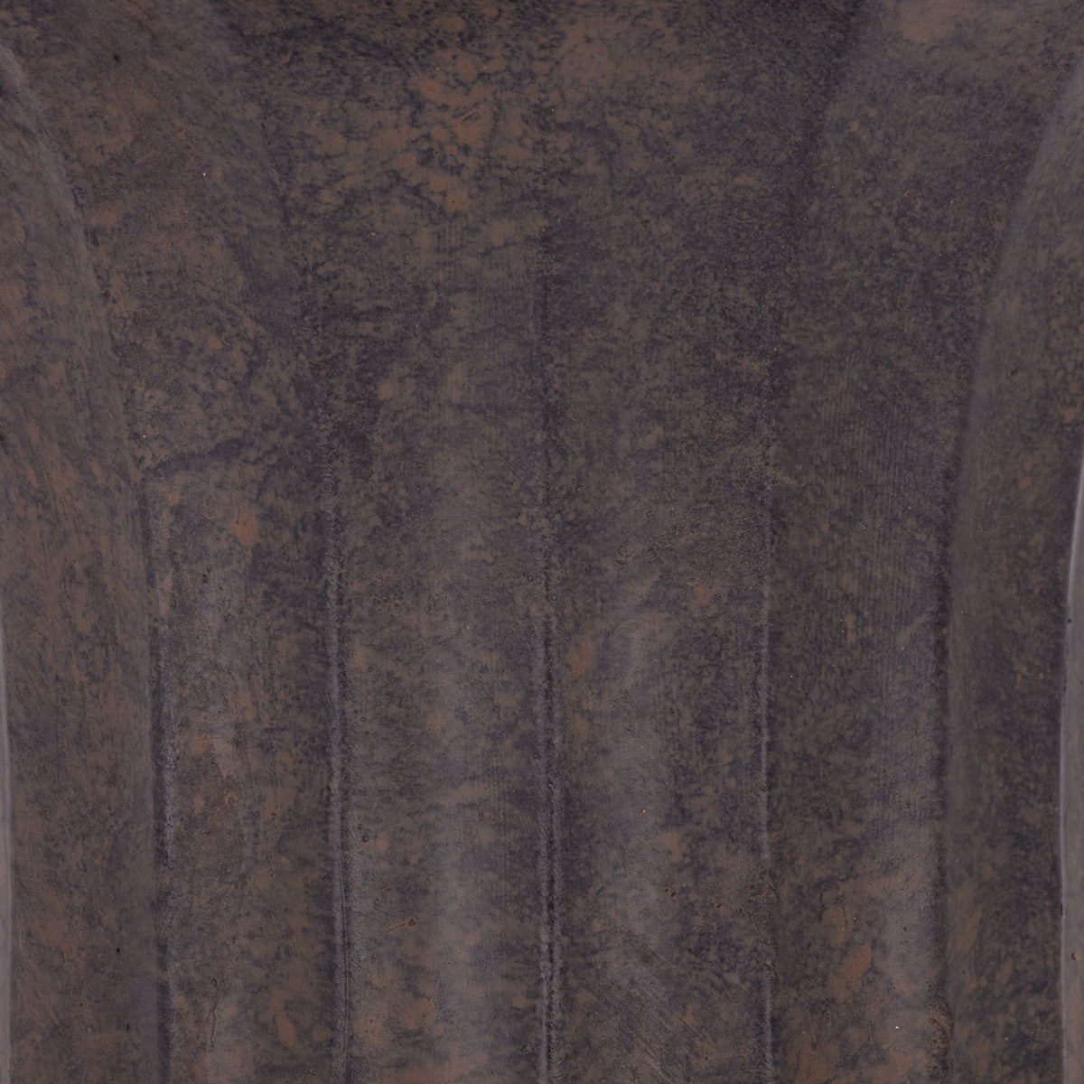 Warm brown highlights soften the dark, mottled finish of the planter's fluted surface. || PAT5045B || swatch_studio