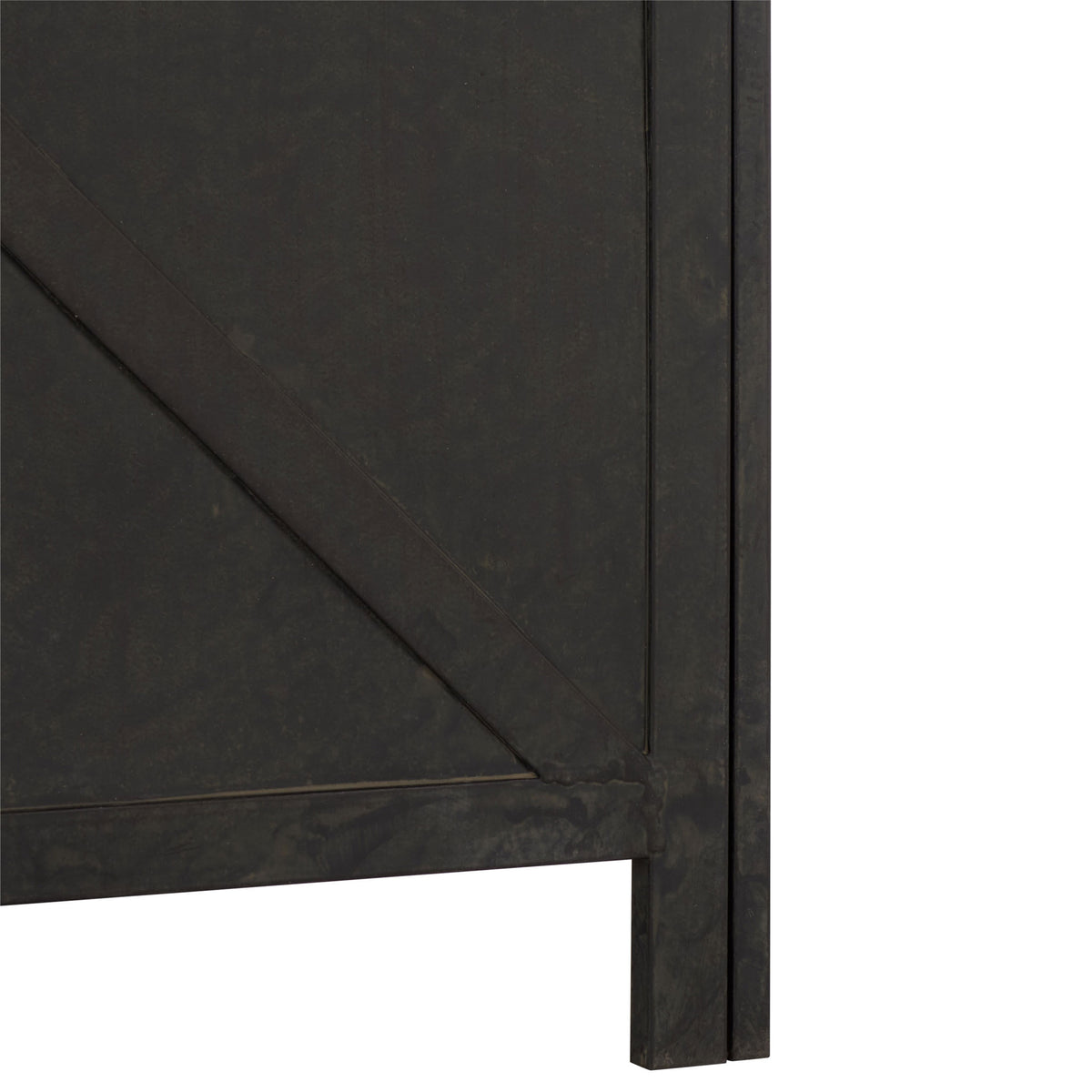 Squared black iron feet lift the paneled planter slightly above the ground.