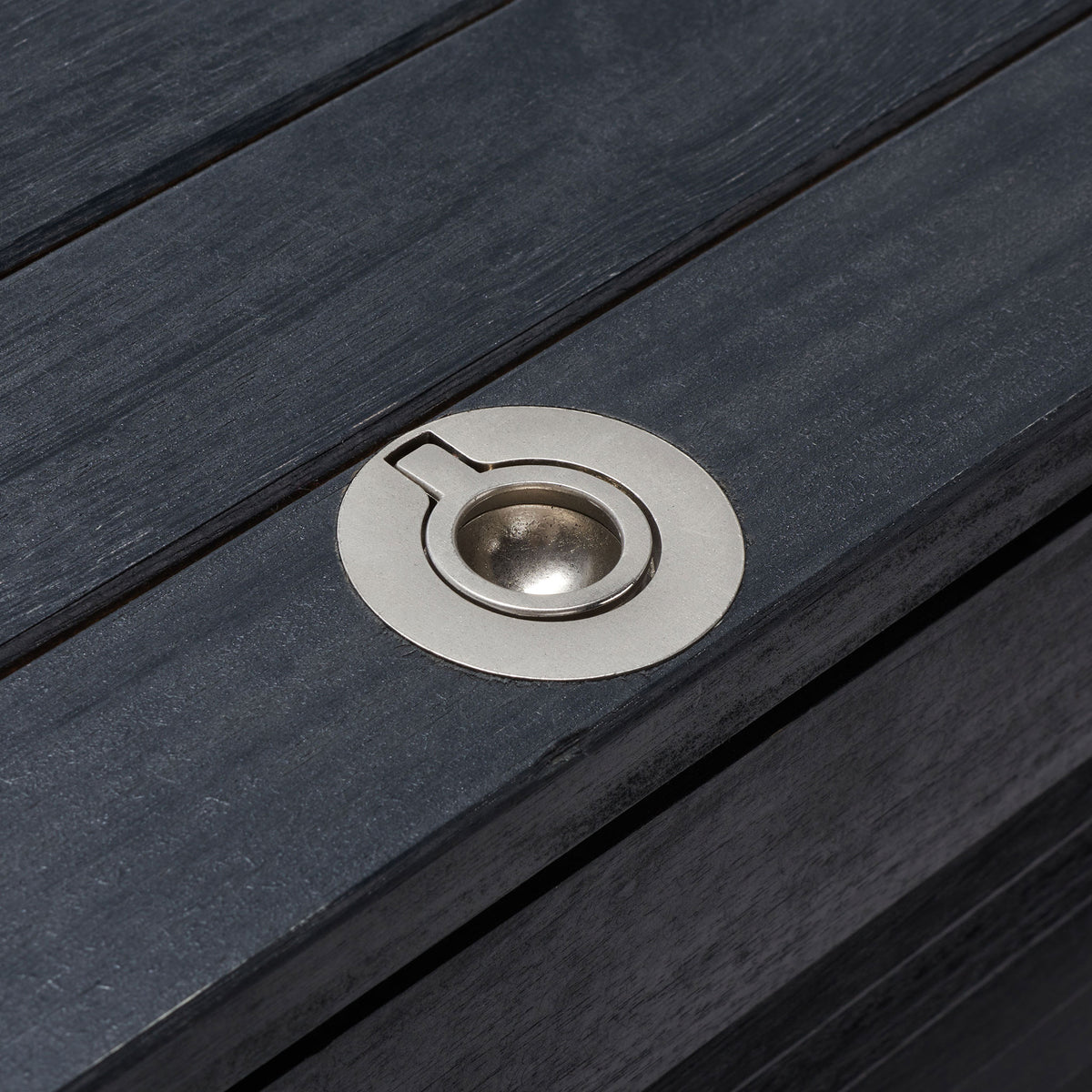 A recessed silver ring pull lies flush in the black slatted lid for easy access || PAT7038D || handle_studio