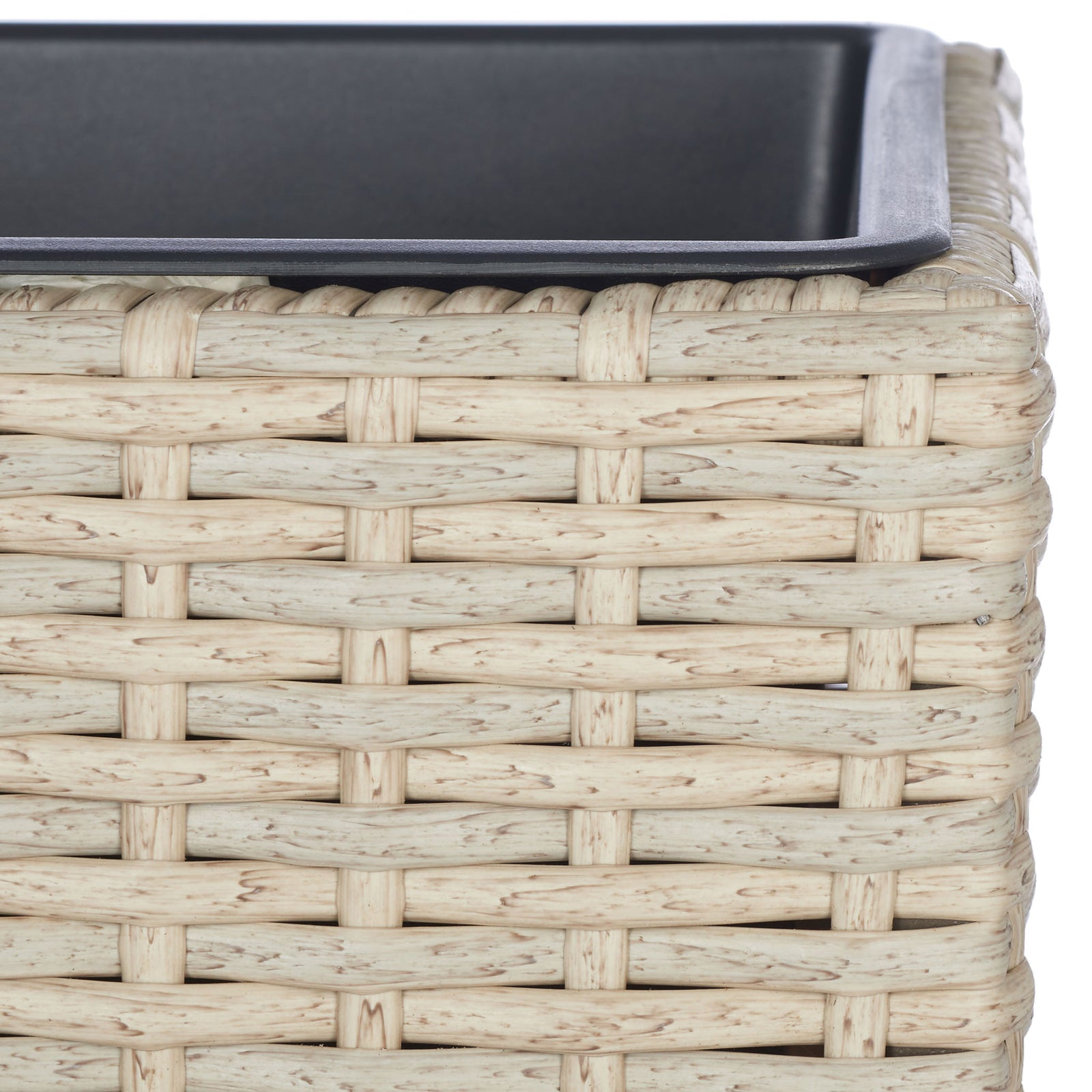 Beige woven strands wrap neatly beneath a black planting insert's rim. || PAT7705B || detail_studio