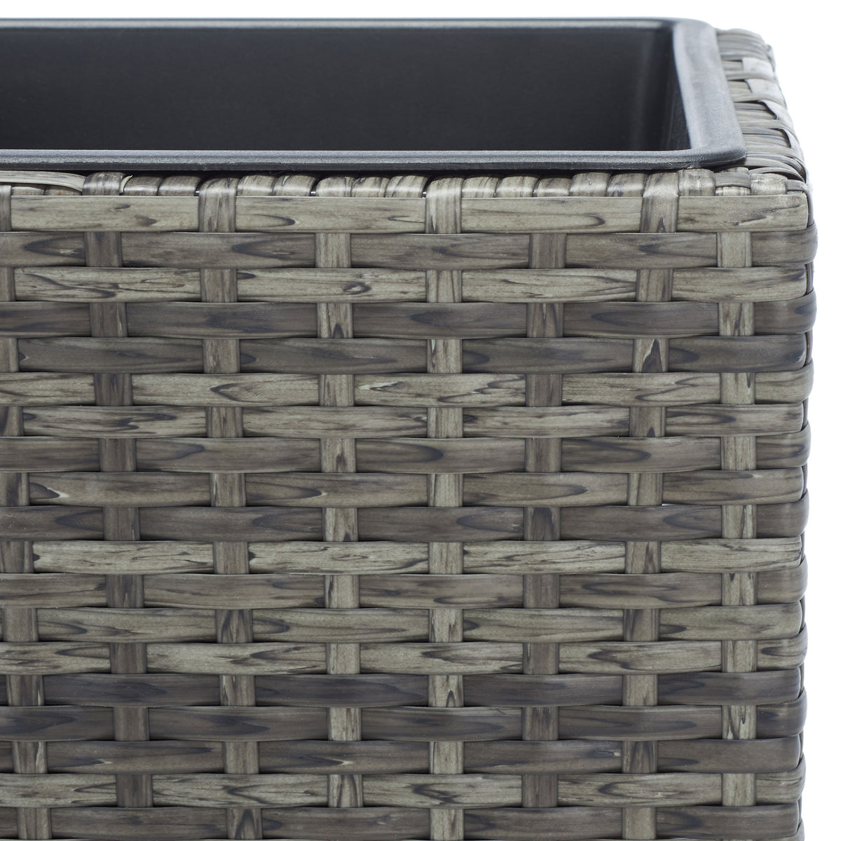 Variegated gray-brown wicker meets a smooth black planter rim. || PAT7705C || detail_studio