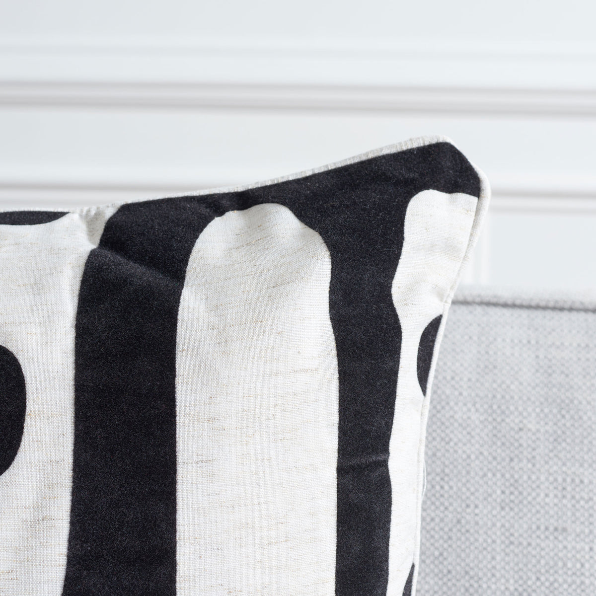 Textured ivory fabric and black applique add tactile contrast to this graphic pillow || PIL162A-2222-SET2 || detail_room