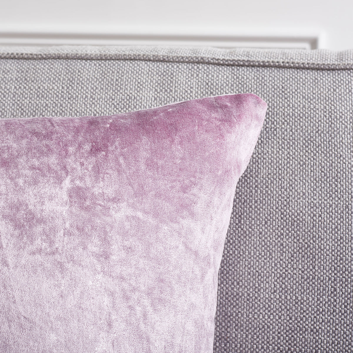 Soft lavender fabric reveals a delicate sheen and a neatly finished upper corner. || PLS500D-1818-SET2 || detail_room