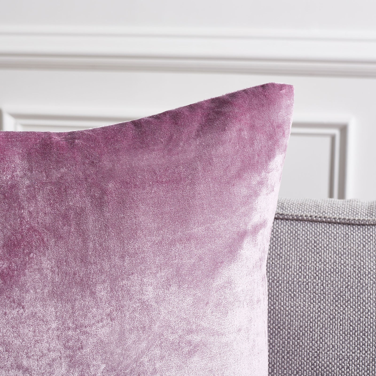 Lavender fabric shimmers across the plush surface of a tailored pillow corner. || PLS500D-2222-SET2 || detail_room