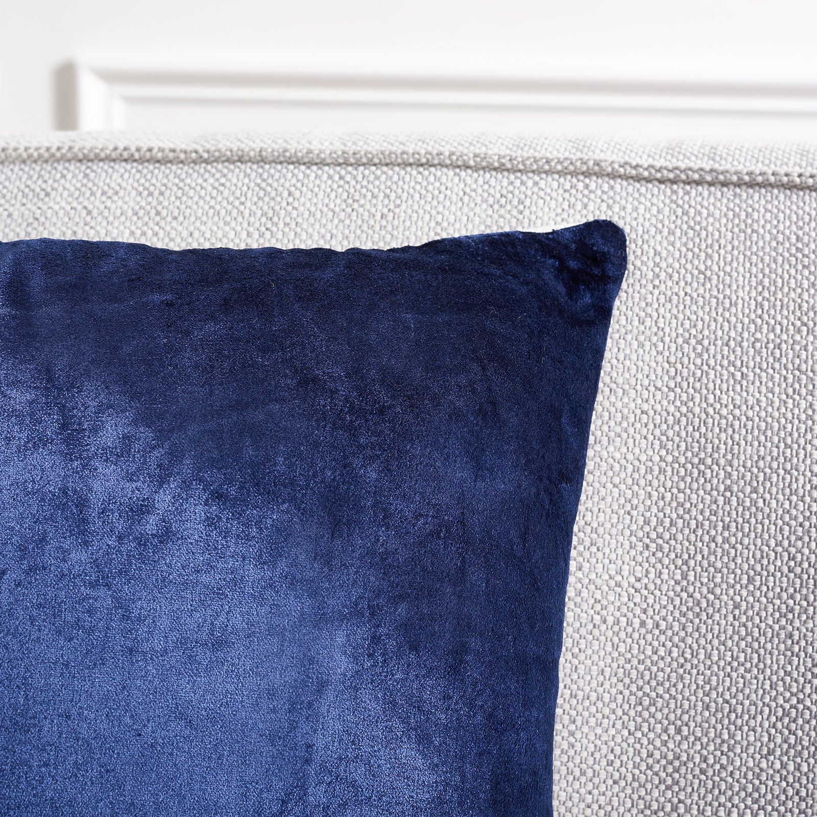 The navy pillow's corner shows a soft, light-catching nap and neat edge seam || PLS503C-1818-SET2 || detail_room