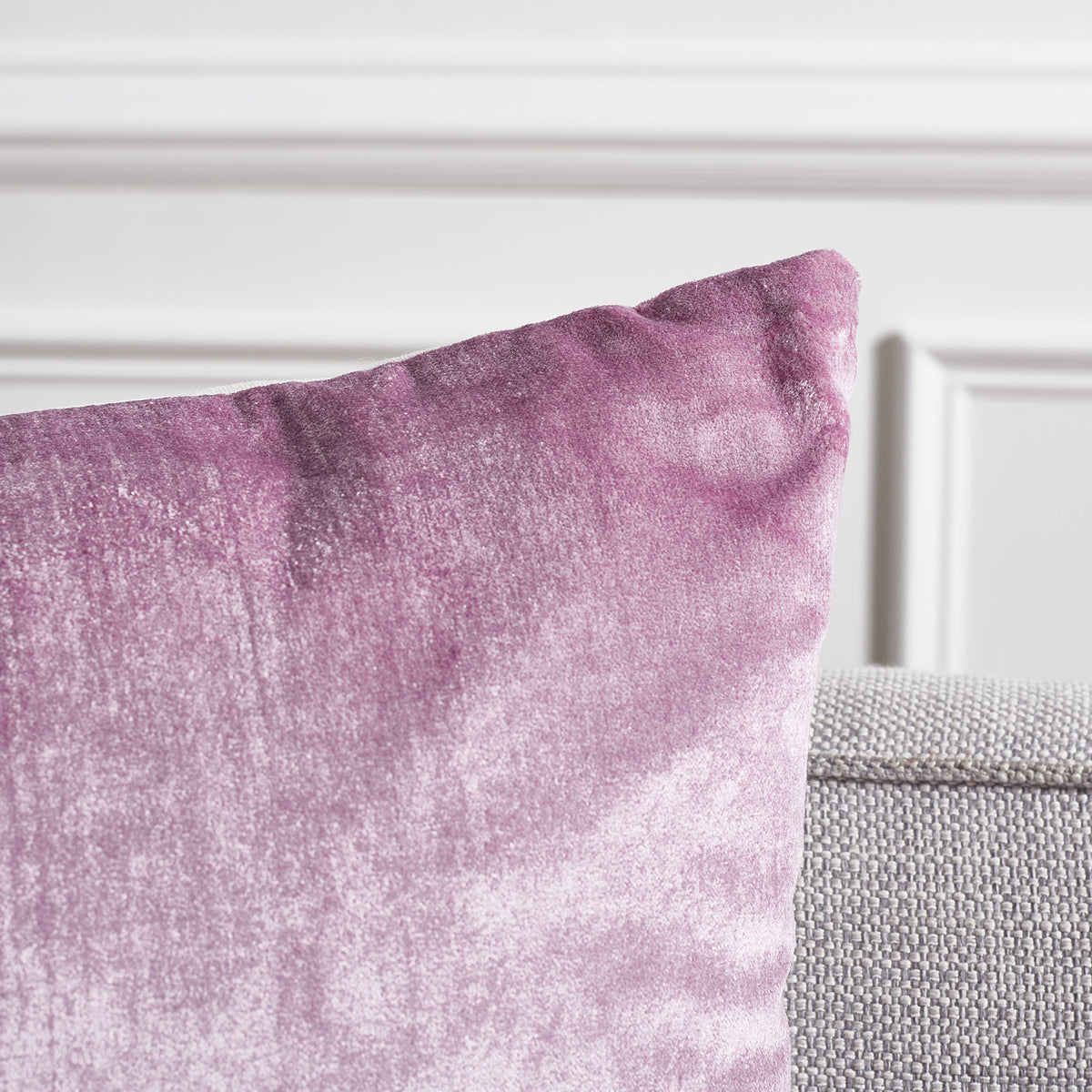 A lavender pillow corner reveals plush texture and soft shifts of light across the fabric || PLS503D-2222-SET2 || detail_room