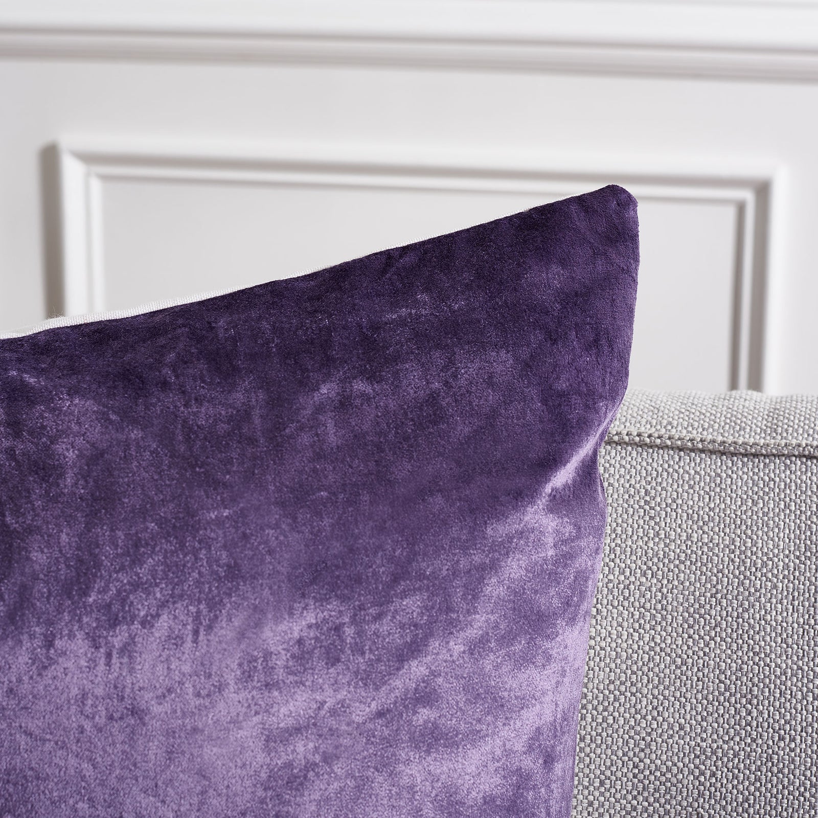 Velvety purple fabric glimmers along the pillow's softly shaped corner || PLS503E-2222-SET2 || detail_room