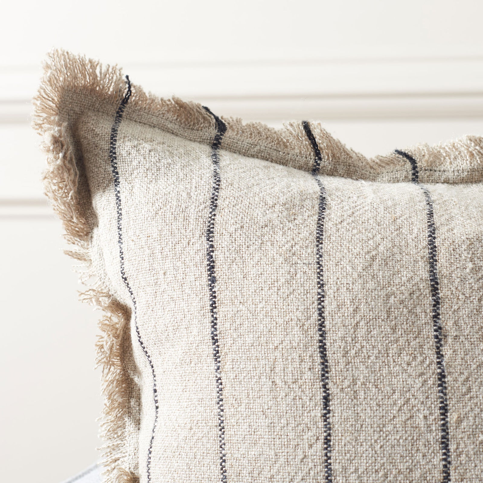 Softly frayed trim frames textured natural linen and fine black stripes || PLS8001A-2020 || detail_room