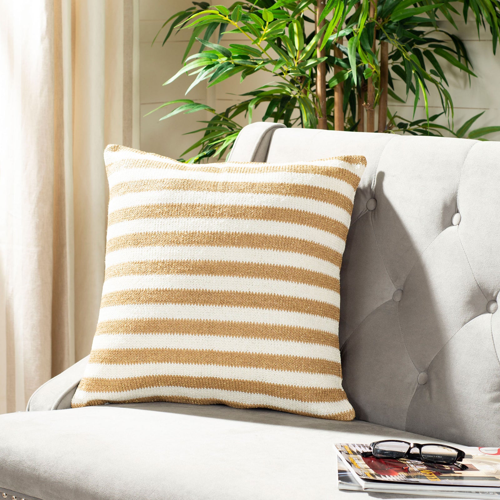 Warm gold and white stripes bring a relaxed, inviting feel to this square pillow || PPL259A-2020 || front_room