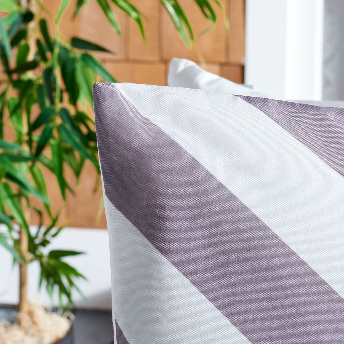 Woven gray and white stripes create a crisp, textured chevron pattern.