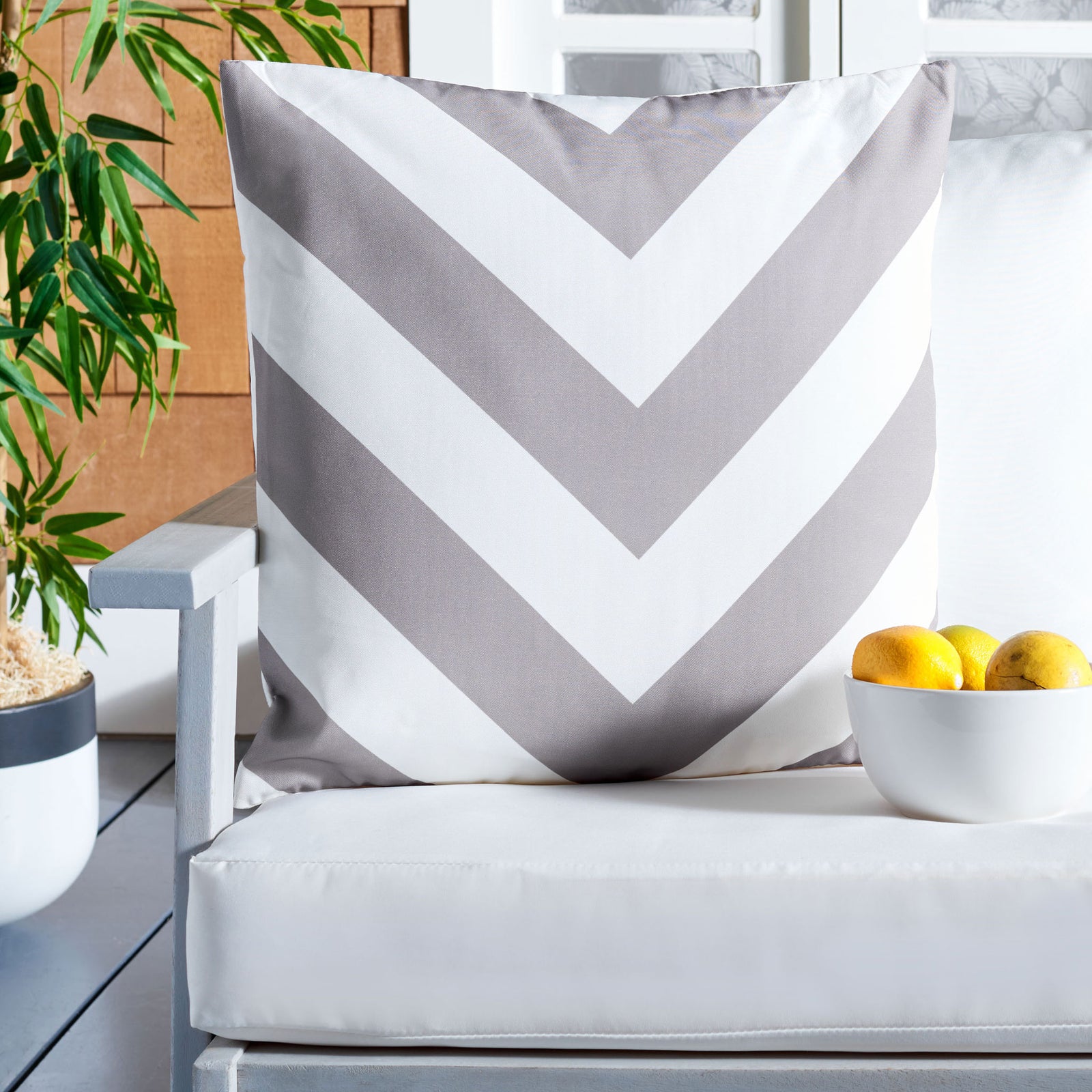 Soft gray chevrons lend a fresh, geometric accent to outdoor seating. || PPL262A-1818 || front_room