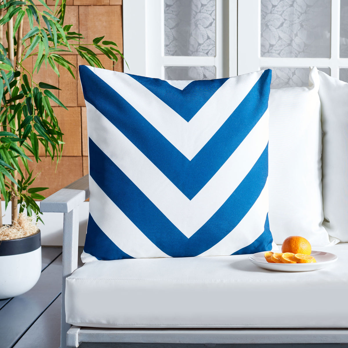 Navy and white chevrons bring a cool graphic accent to outdoor seating.