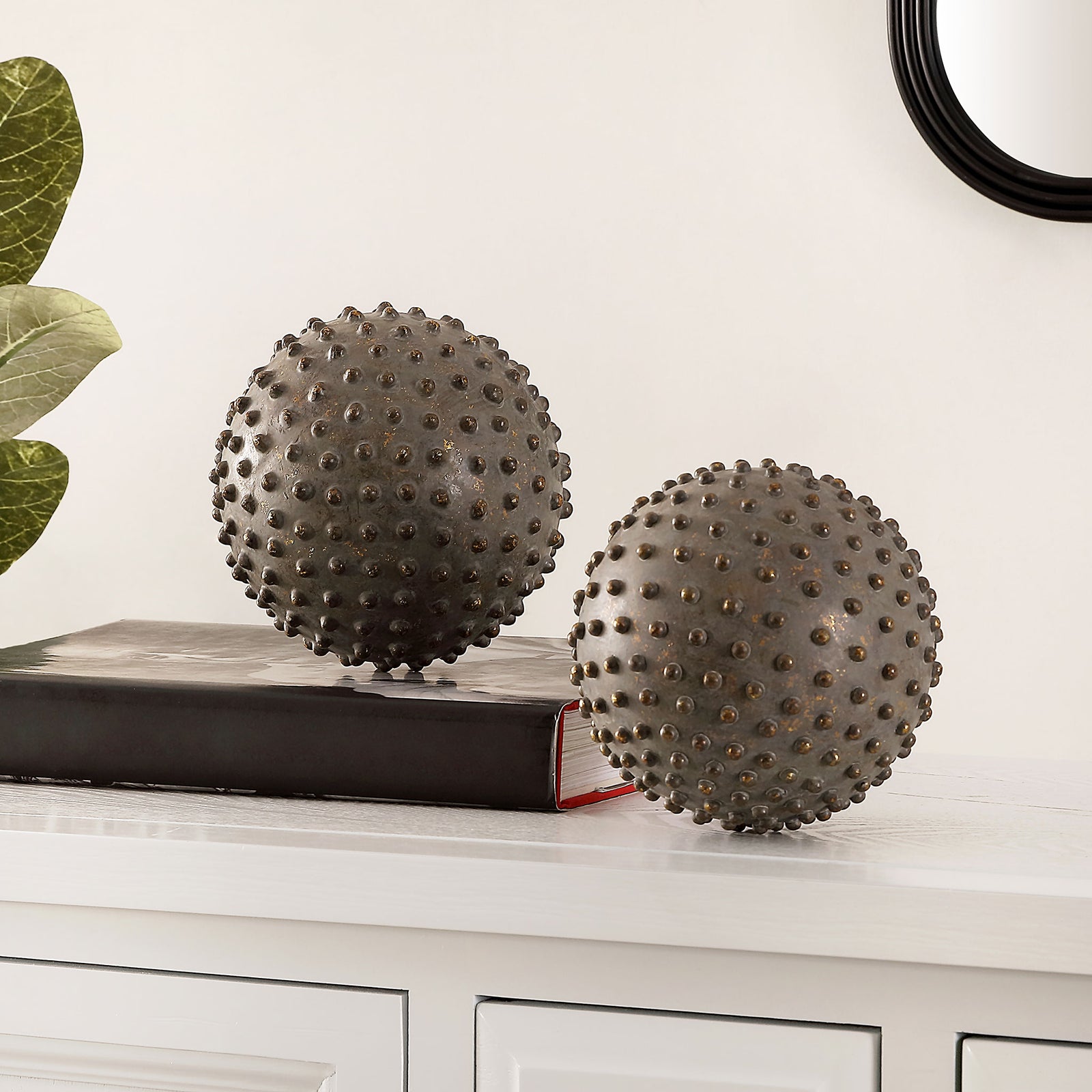 A pair of studded decorative spheres adds sculptural texture to a tabletop display || RDC1201A-SET2 || front_room