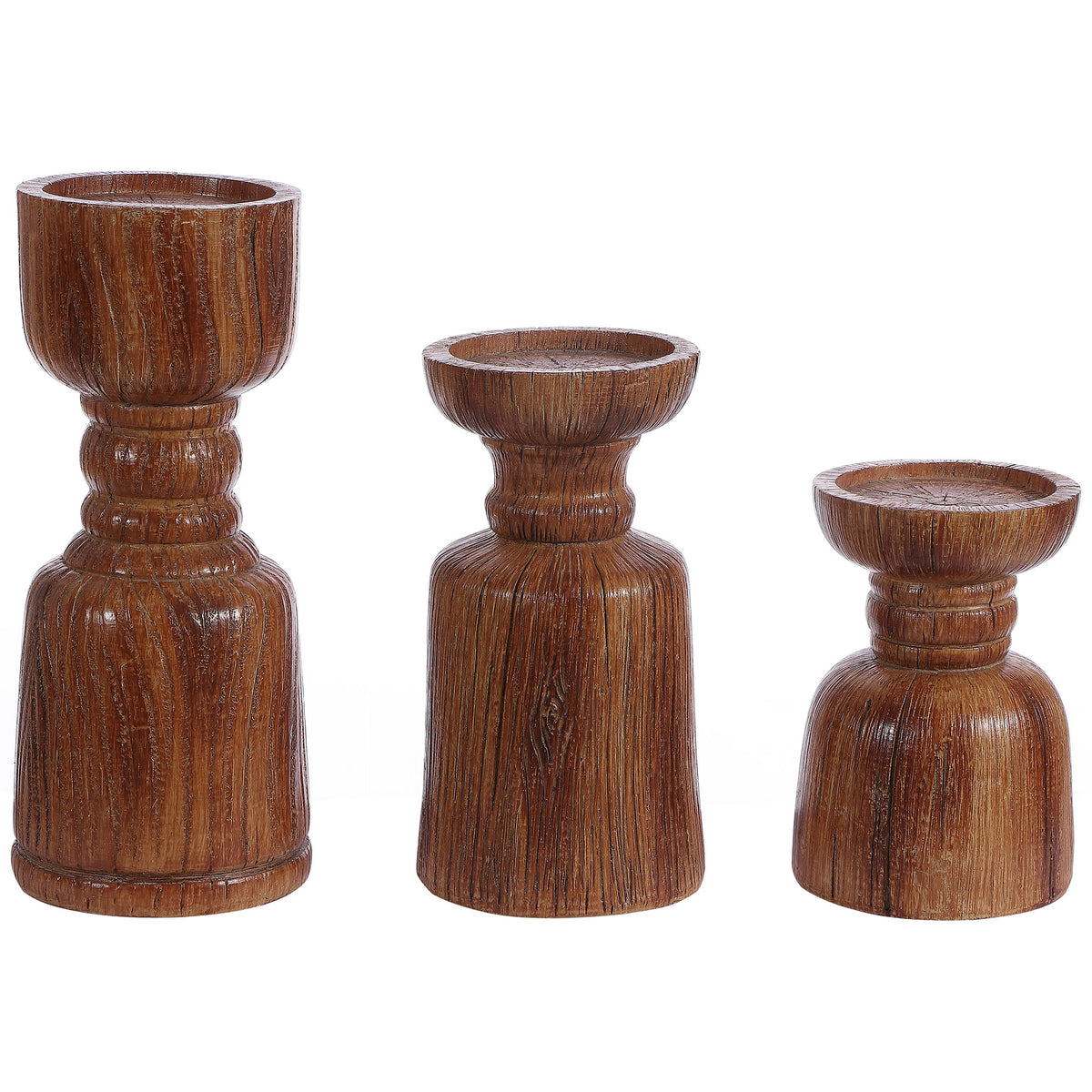 Three graduated brown polyresin candle holders feature textured grain and sculpted pedestal forms. || RDC1202A-SET3 || front_angle_studio