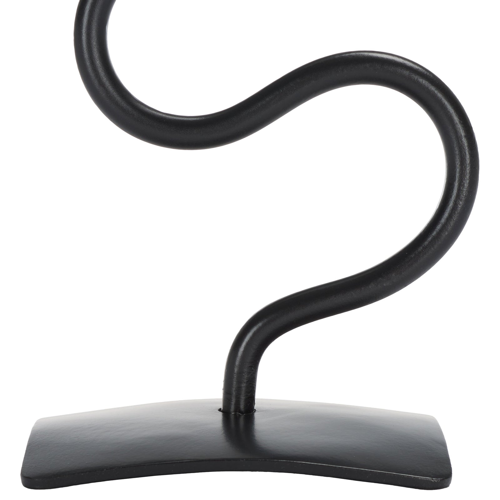 A curved black base anchors the smooth, looping iron stem of the candle holder || RDC2502A-SET2 || leg_studio
