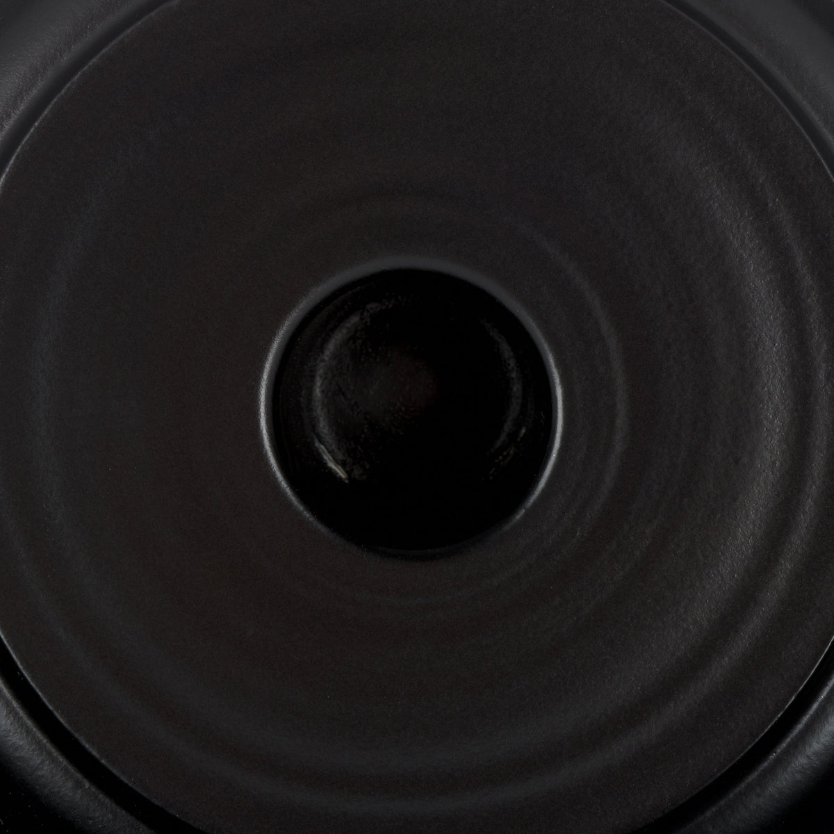 Smooth black finish surrounds the recessed candle opening in the metal tray || RDC2502A-SET2 || detail_studio