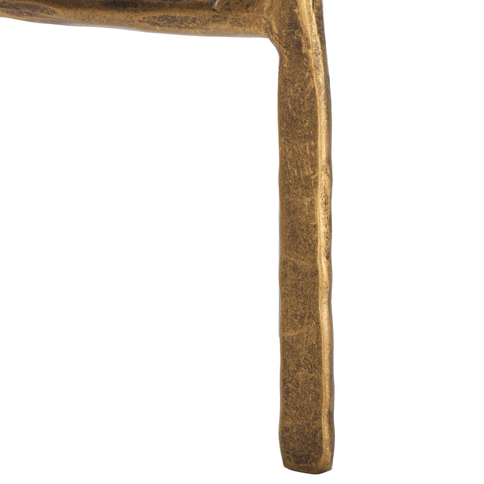 A gently tapered foot shows the iron candleholder's warm, textured brass finish. || RDC2503A || leg_studio