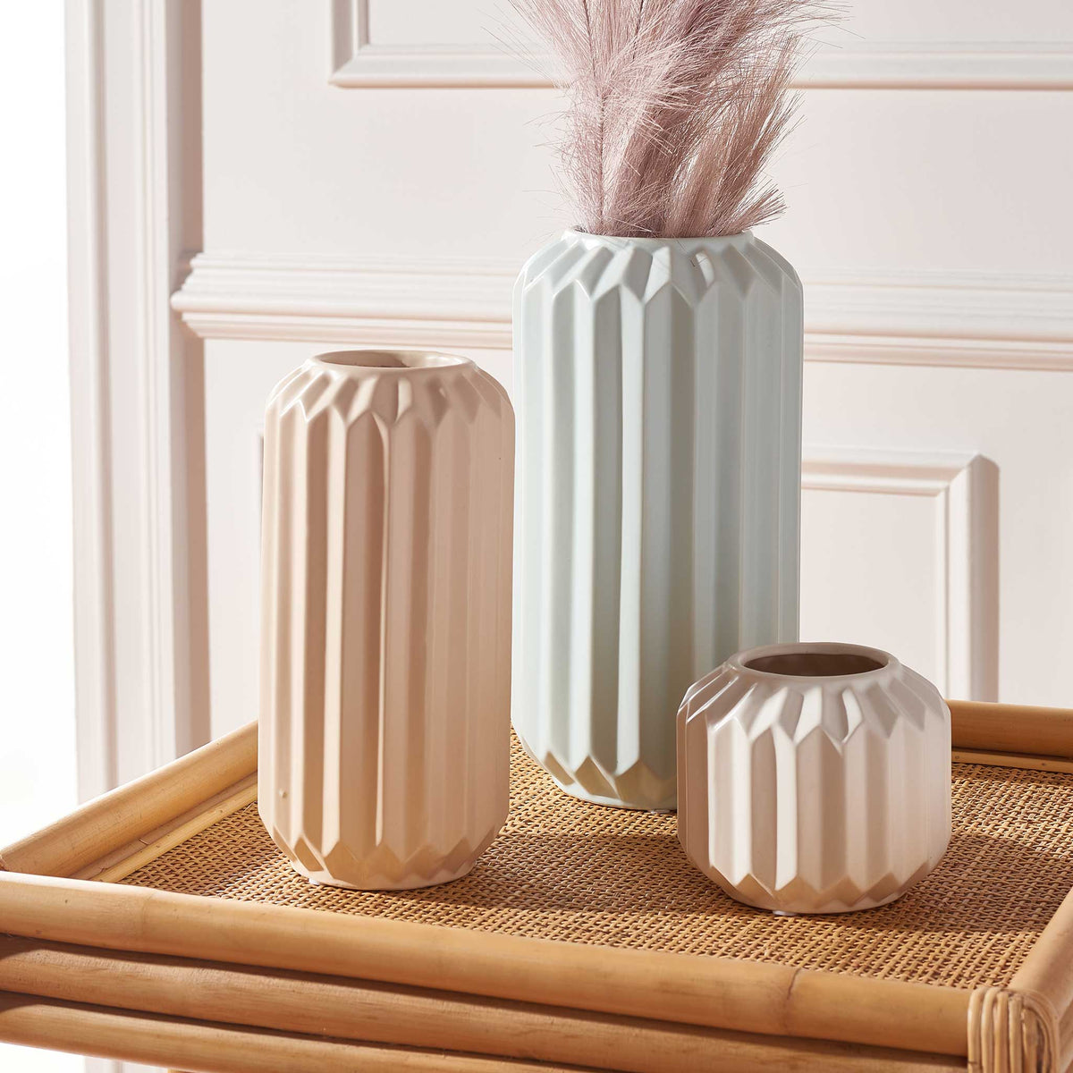 Trio of faceted ceramic vases in soft blue, blush, and white for a modern, sculptural accent. || RDC4013B-SET3 || front_room