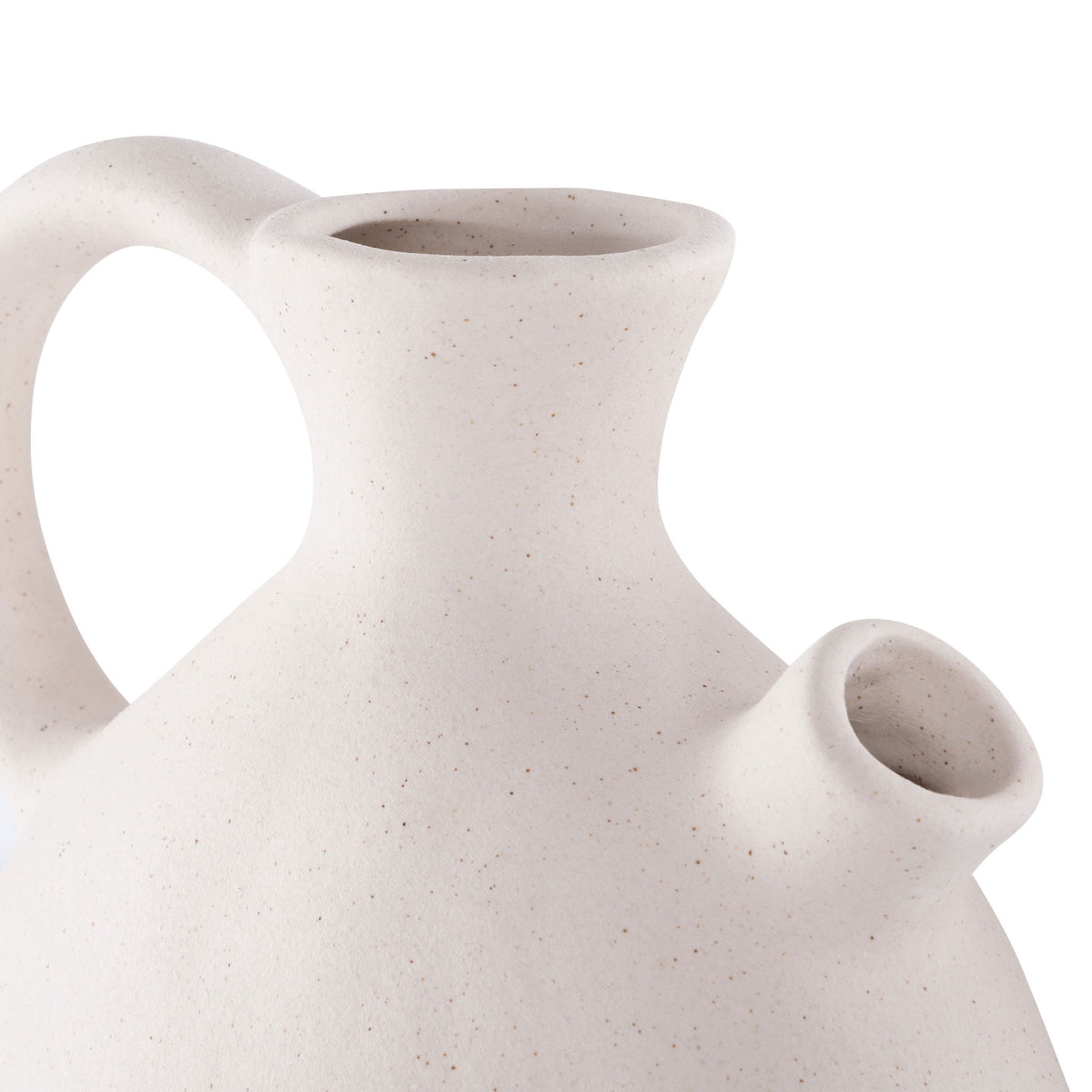 A curved ceramic vase features a loop handle and petite side spout in softly speckled beige. || RDC4015A-SET4 || detail_studio