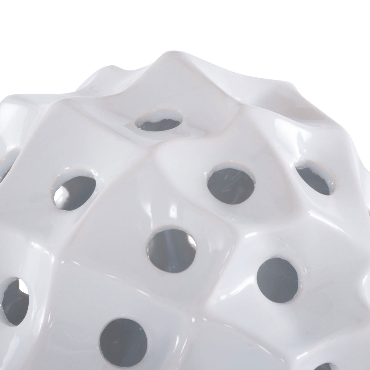 Glossy white ceramic ridges sweep around circular openings for light, sculptural texture. || RDC4019A-SET2 || detail_studio