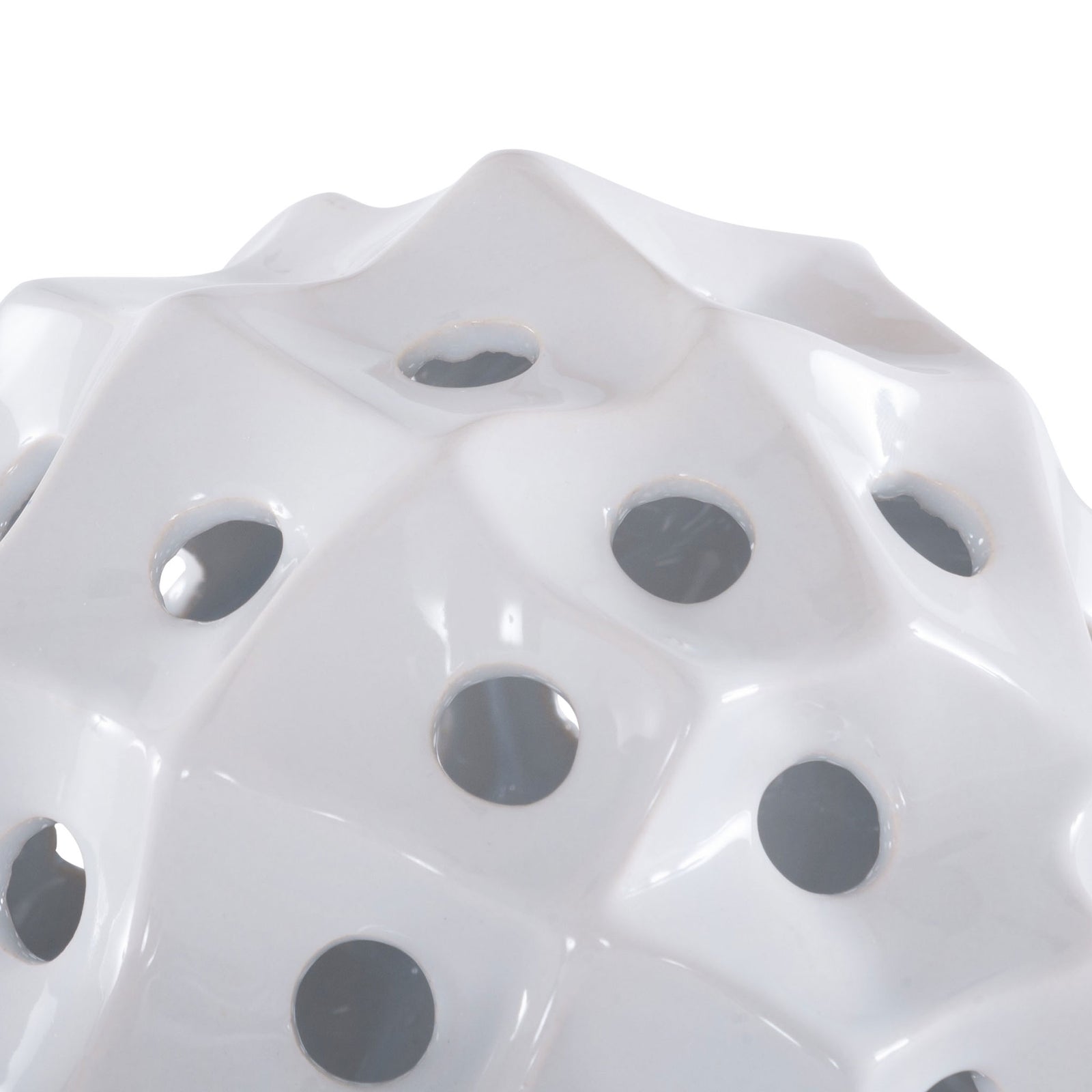 Glossy white ceramic ridges sweep around circular openings for light, sculptural texture. || RDC4019A-SET2 || detail_studio