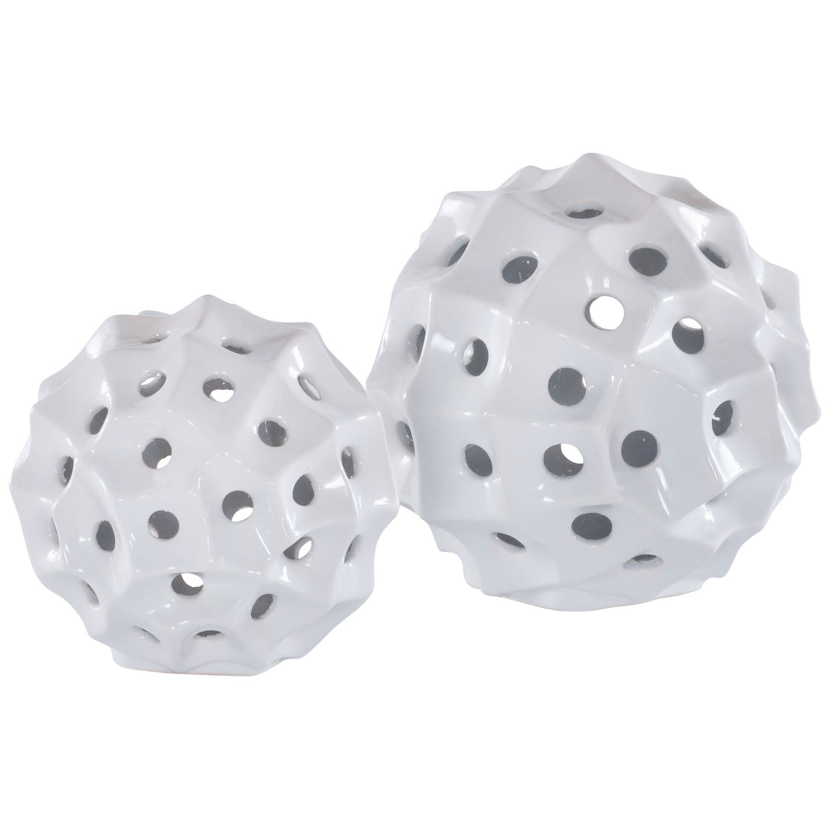 Two glossy white ceramic spheres in contrasting sizes pair geometric contours with airy circular cutouts. || RDC4019A-SET2 || front_studio