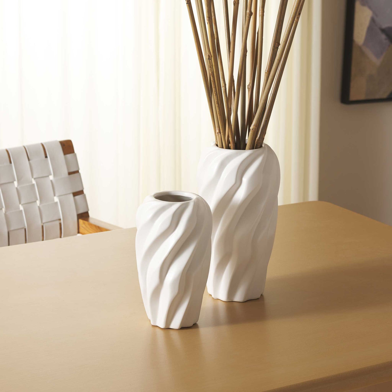 Cream ceramic vases add soft, sculptural texture to a tabletop, styled with natural stems for warmth || RDC4021A-SET2 || front_angle_room