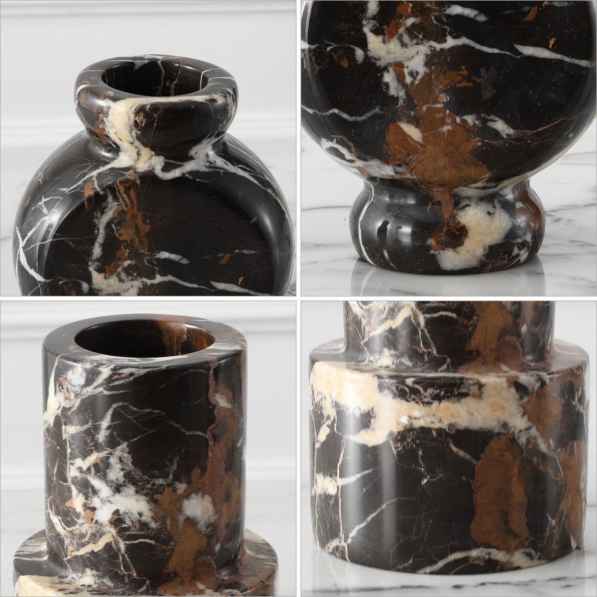 Creamy white veins and earthy brown marbling trace the black stone, highlighting each vase's sculptural curves