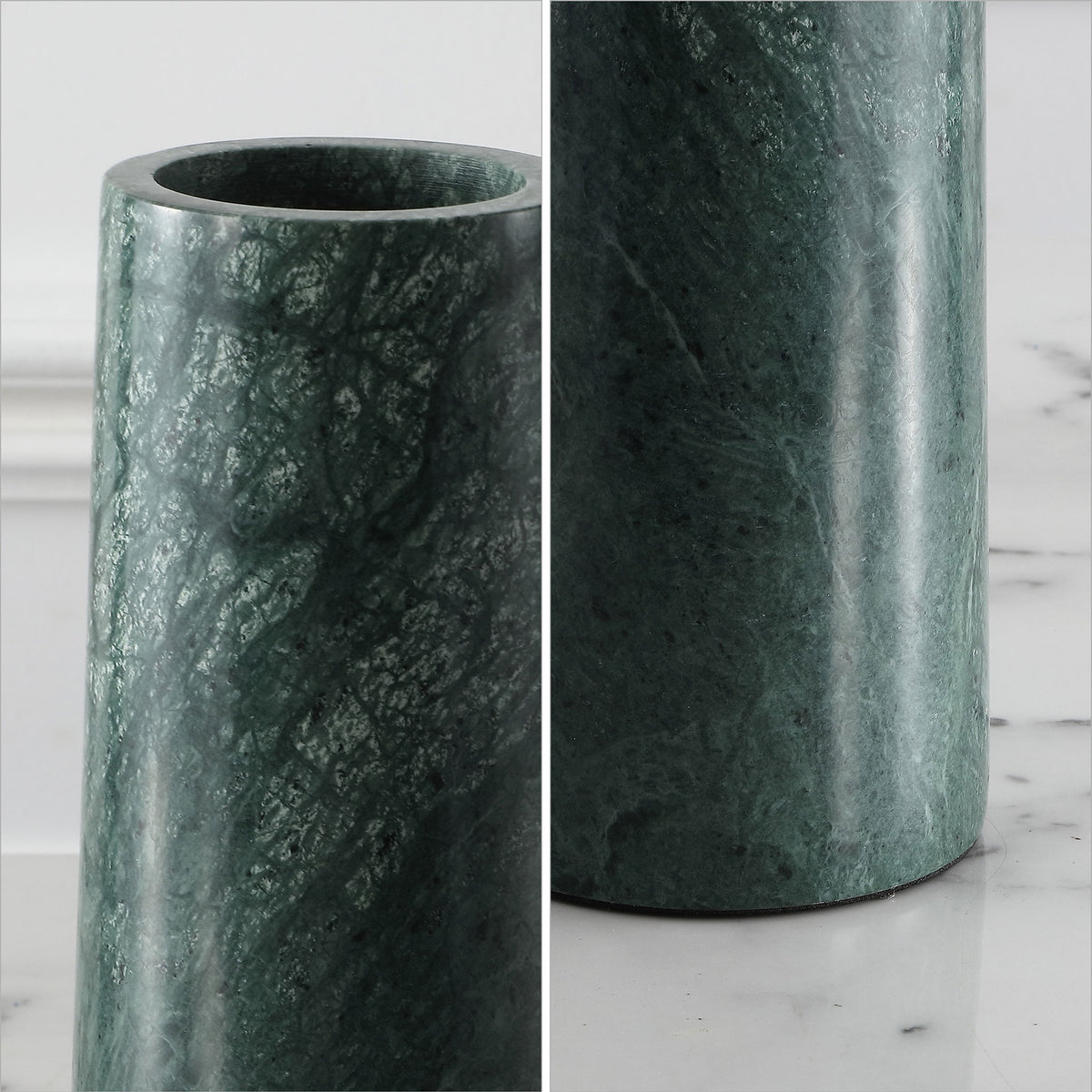Deep green marble veining and smooth, rounded openings give the vases sculptural appeal.