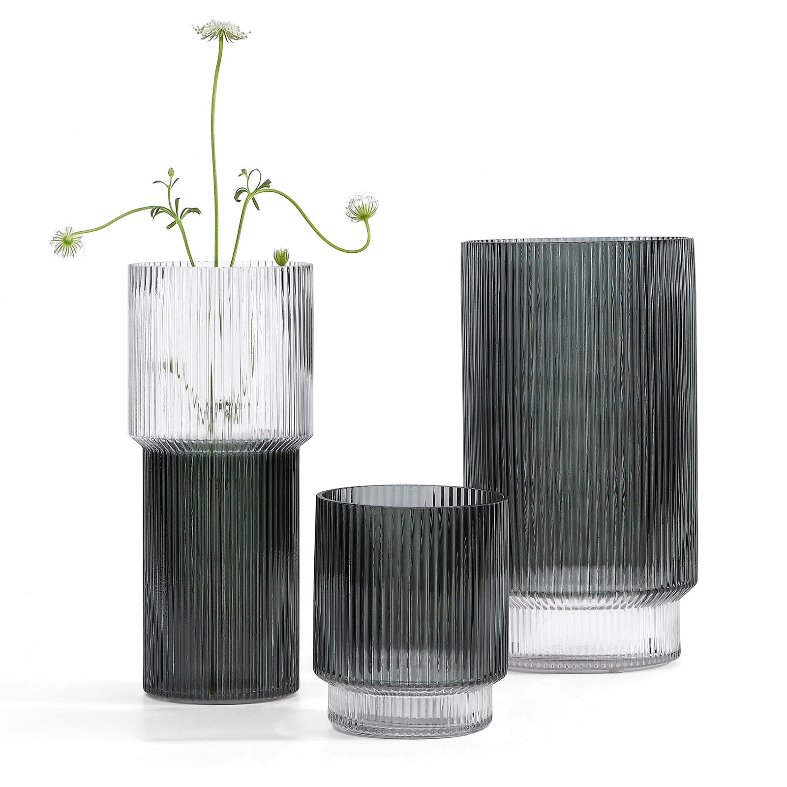 Blue-gray fluted glass vases combine clear accents with airy blossoms and varied silhouettes. || RDC4034A-SET3 || front_angle_studio