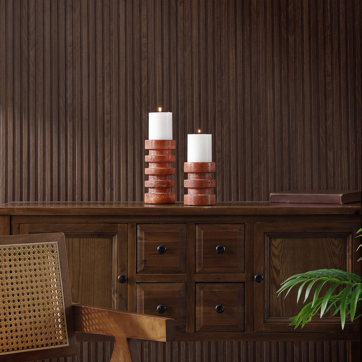 Rust-orange candle holders add sculptural texture and soft candlelight to a dark wood console. || RDC4043A-SET2 || front_room
