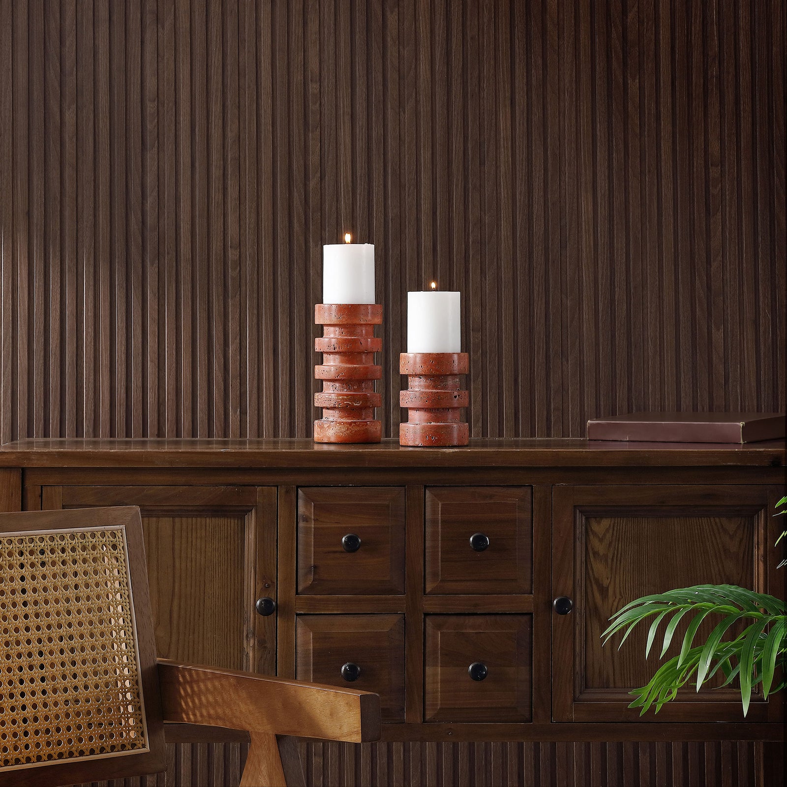 Rust-orange candle holders add sculptural texture and soft candlelight to a dark wood console. || RDC4043A-SET2 || front_room