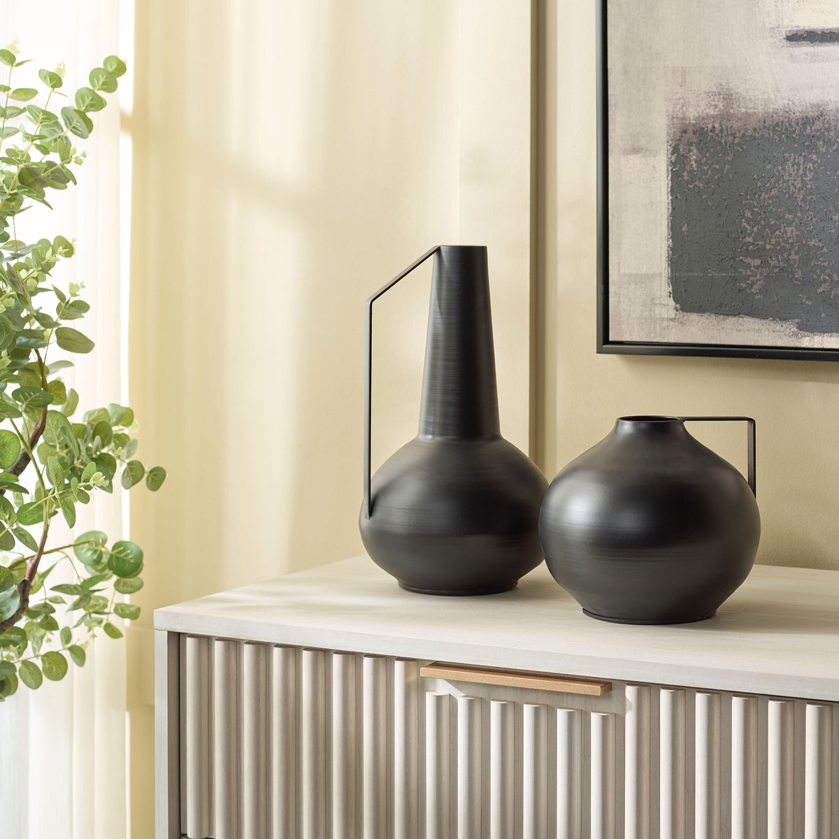 A tall tapered vase and rounded companion create an artful black iron display on a console || RDC4050A-SET2 || front_room