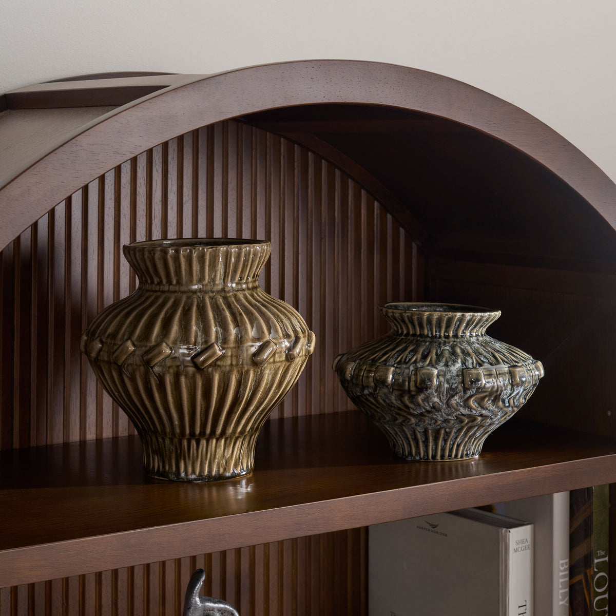 The brown and blue-gray ceramic vases add sculptural texture and a glossy sheen to a wood shelf. || RDC4058A-SET2 || front_room