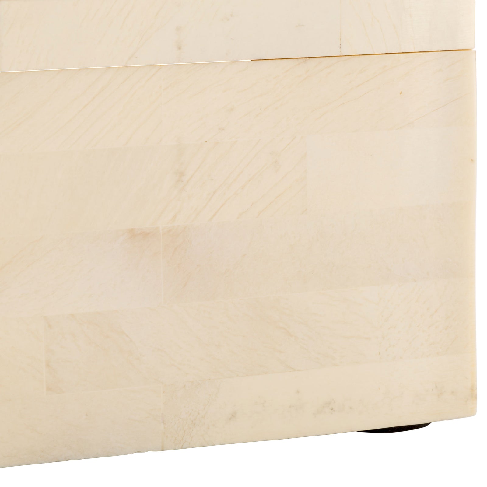 A discreet dark foot lifts the box above the surface beneath softly grained ivory panels. || RDC5002A-SET2 || leg_studio