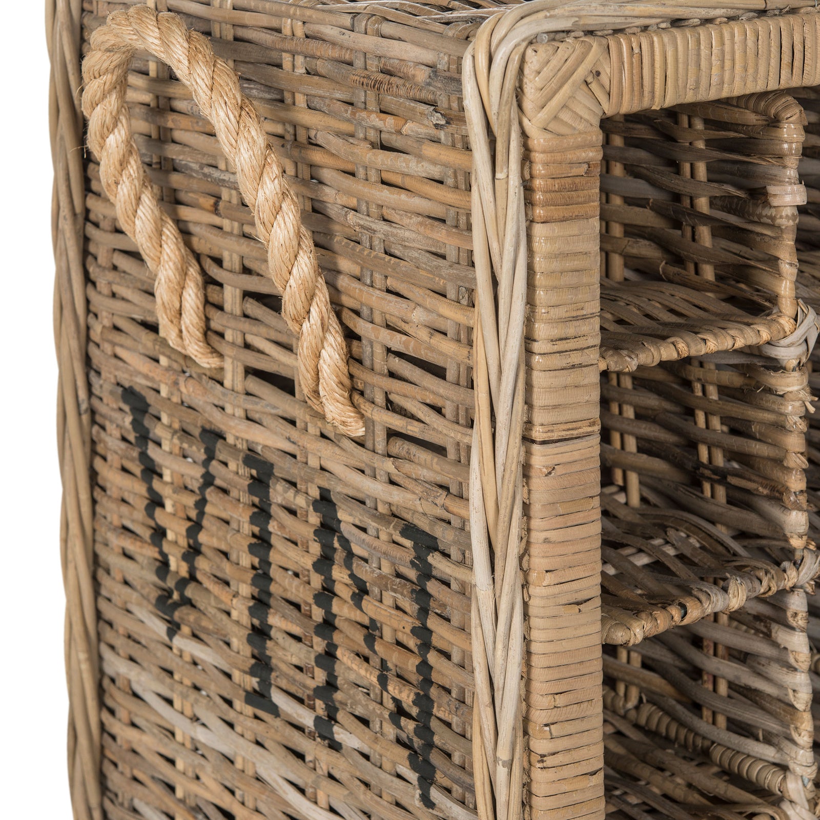 A braided rope handle accents the textured rattan side and bold stenciled lettering. || SEA7016A || handle_studio