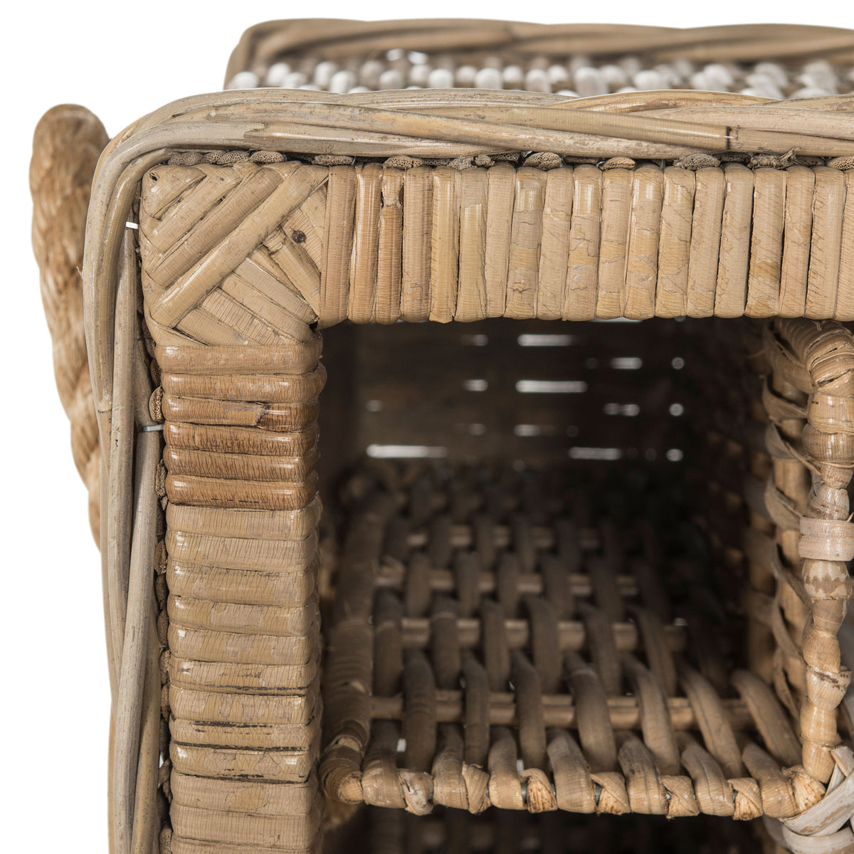 Wrapped rattan edges and tightly woven bottle shelves add rich texture to the rack. || SEA7016A || detail_studio