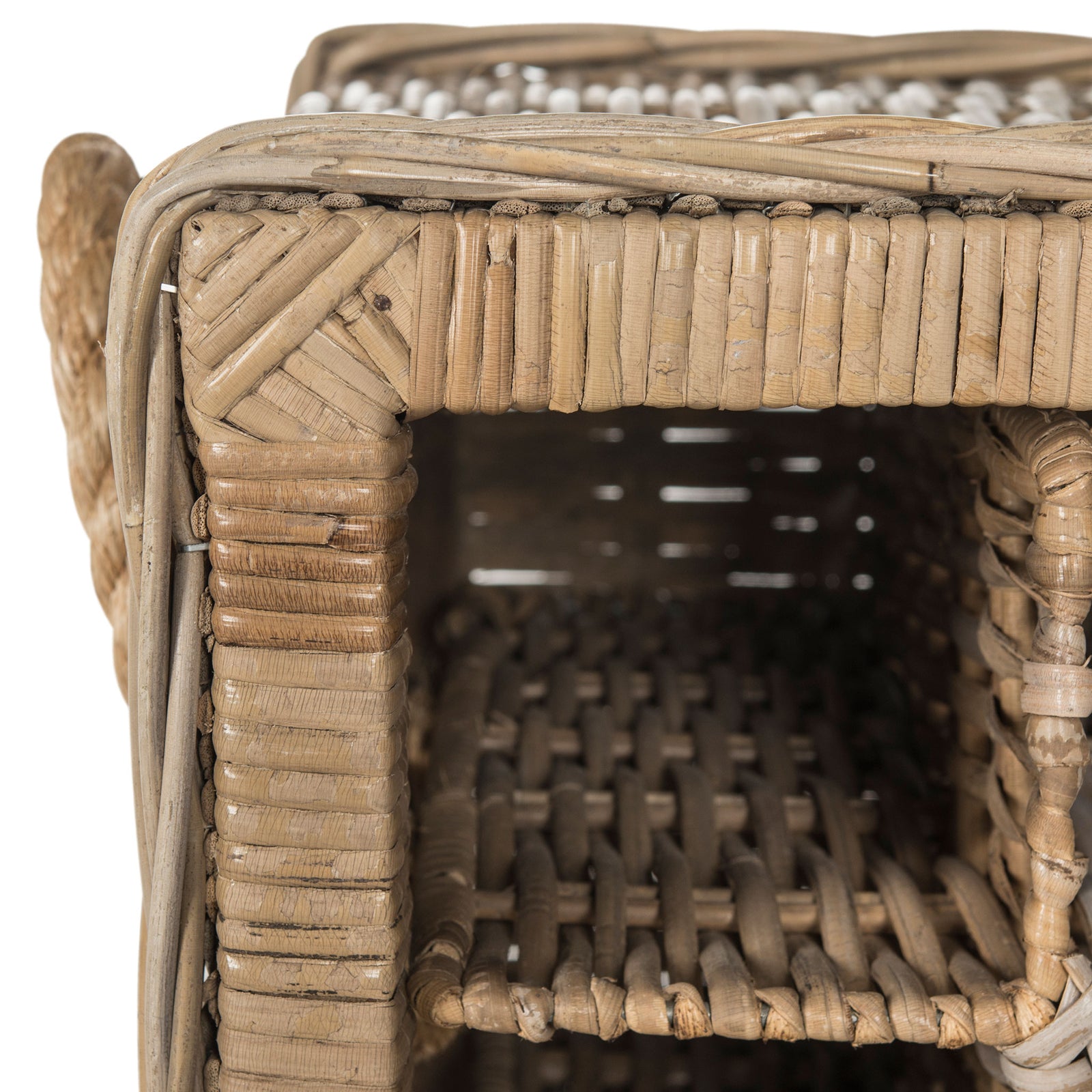 Wrapped rattan edges and tightly woven bottle shelves add rich texture to the rack. || SEA7016A || detail_studio