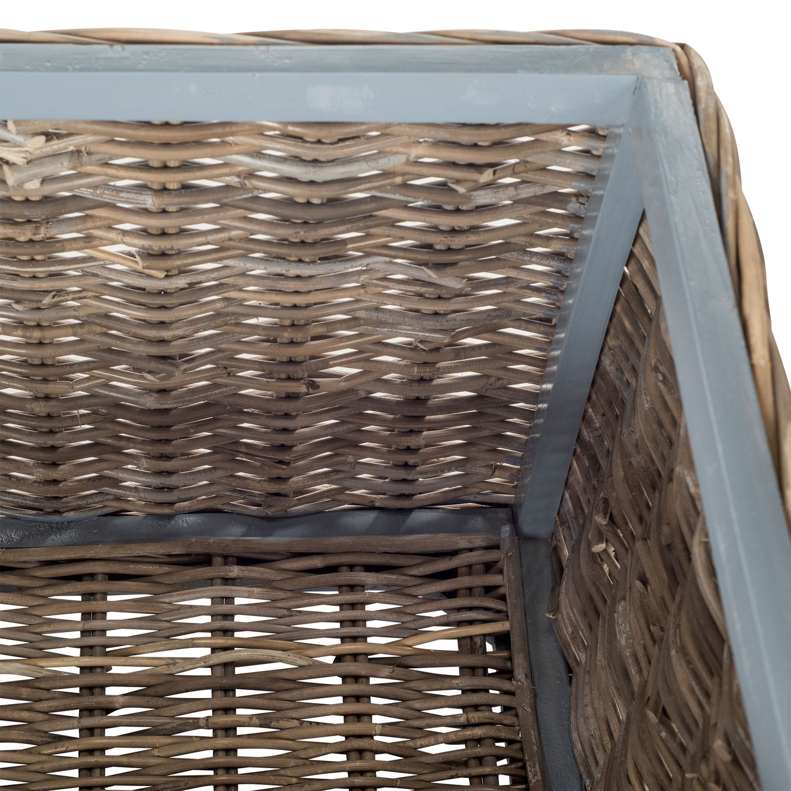 The trunk's storage compartment reveals woven rattan walls, a woven base, and sturdy corner framing. || SEA7018A || storage_open_studio