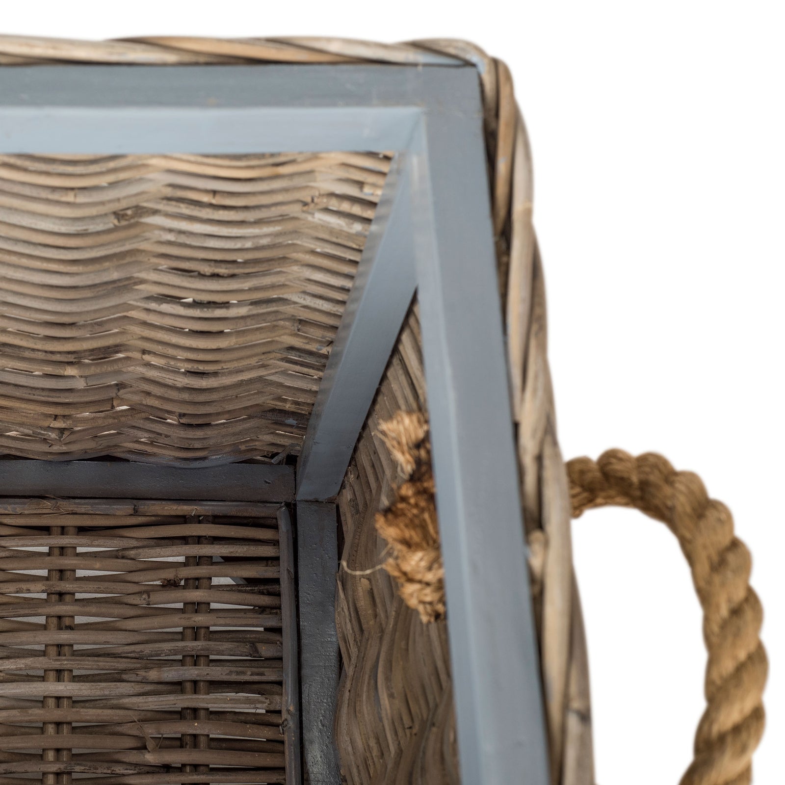 A sturdy gray frame reinforces the tightly woven rattan inside the storage trunk. || SEA7019A || detail_studio