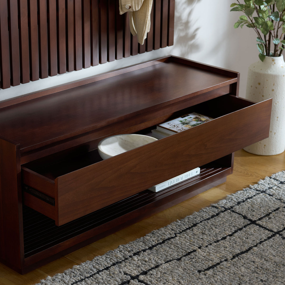 A roomy pullout drawer and slatted lower shelf offer handy entryway storage || SFV4214A || storage_open_room