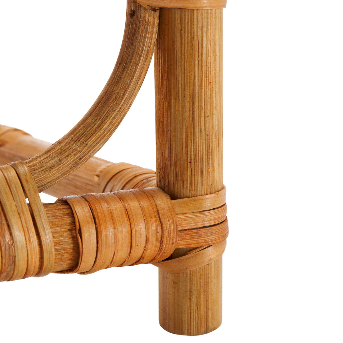 Wrapped rattan joints and sturdy feet support the arched bottle rack