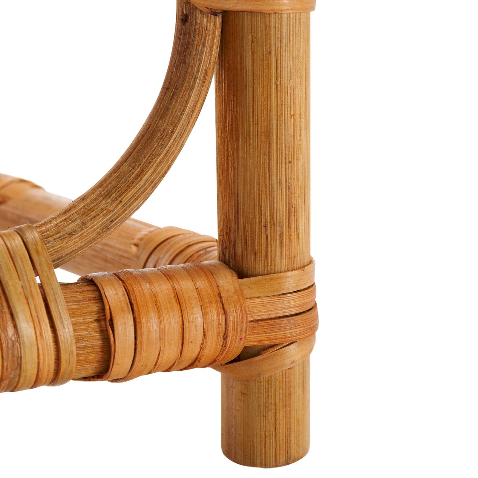 Wrapped rattan joints and sturdy feet support the arched bottle rack || STG1801A || leg_studio