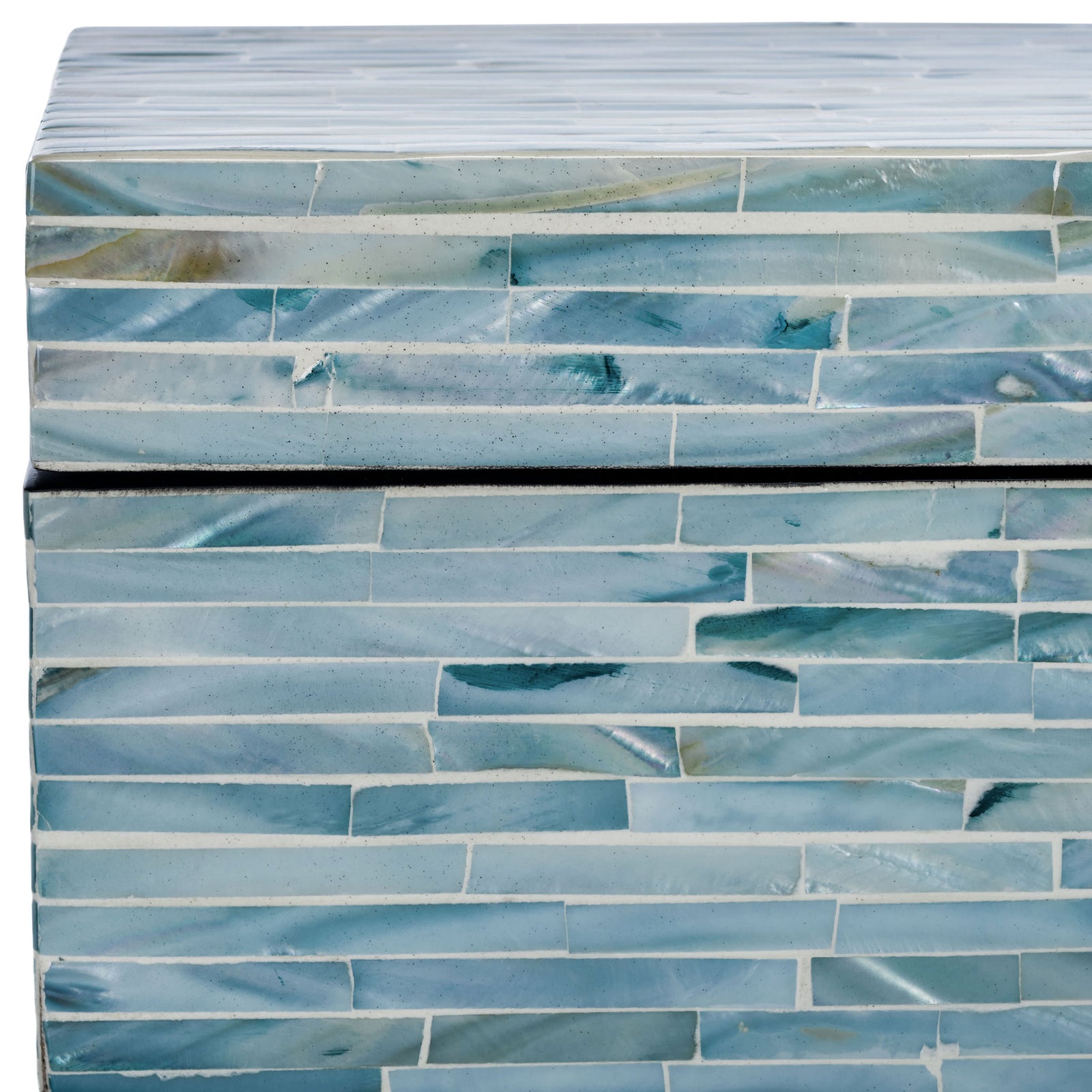 Pearlescent blue and gray tiles shimmer along the lid seam and body of a decorative storage box. || STG1812A || detail_studio