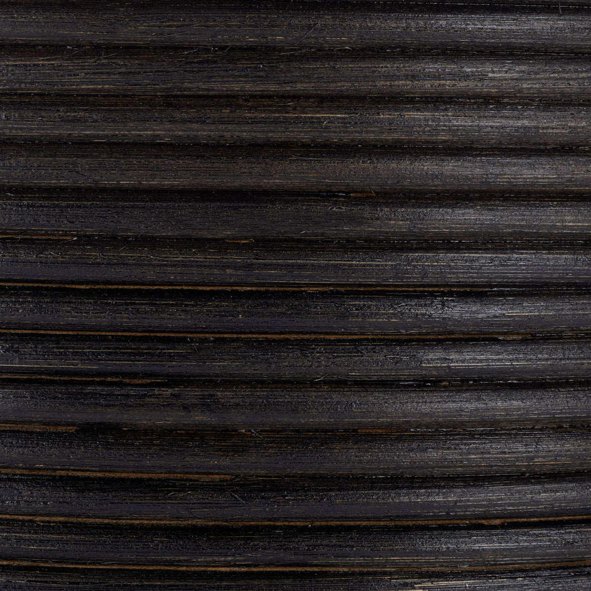 Black rattan coils reveal subtle natural variation and a richly ribbed texture || STG1816A || swatch_studio